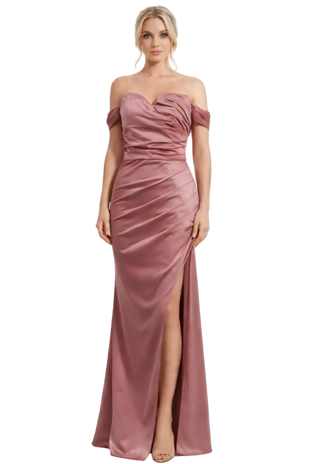Woman wearing a pink strapless gown with a slit on a white background