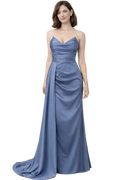 Woman wearing a blue strapless gown on a white background