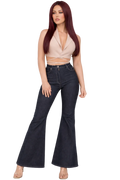 Woman wearing a beige top and black flared jeans on a white background
