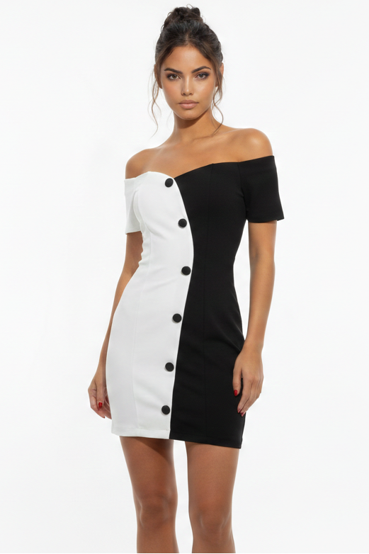 Woman wearing a black and white off-shoulder dress on a white background