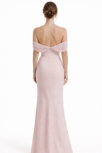 Pink off-shoulder gown with a deep back on a white background