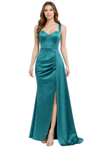 Teal evening gown with a slit on a white background