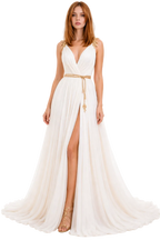 Woman wearing a white gown with a gold belt on a white background