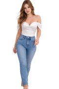 Woman wearing a white off-shoulder top and blue jeans on a white background